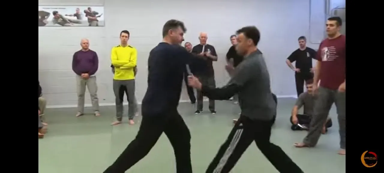 Systema group training — participants practising an application in the training circle